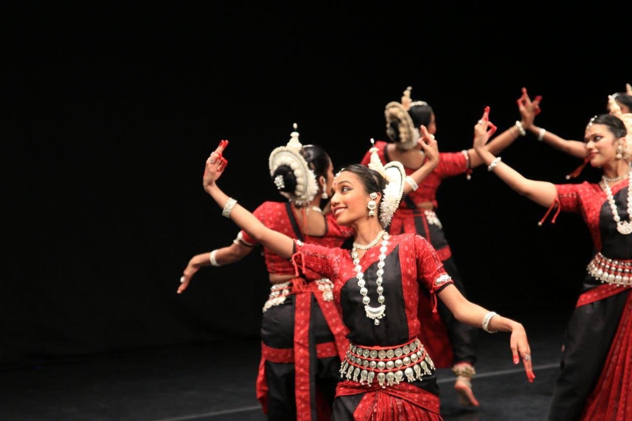Classical dancer performing a solo with ensemble